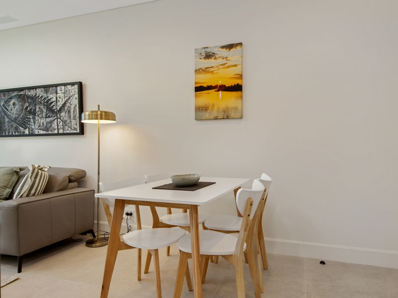 Contemporary dining setup with a calm, welcoming feel