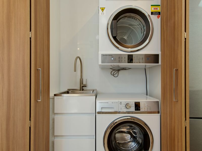 In-unit laundry with washer and dryer for added convenience