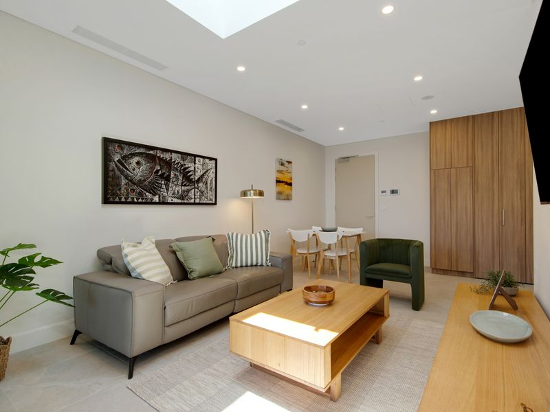 Bright and stylish living area with comfortable seating