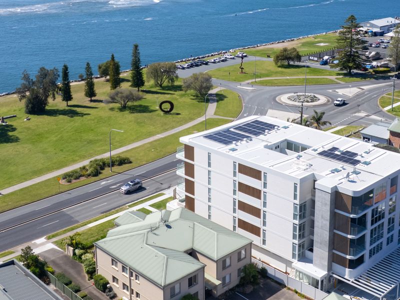 Bird’s-eye view of the building and beautiful coastal setting