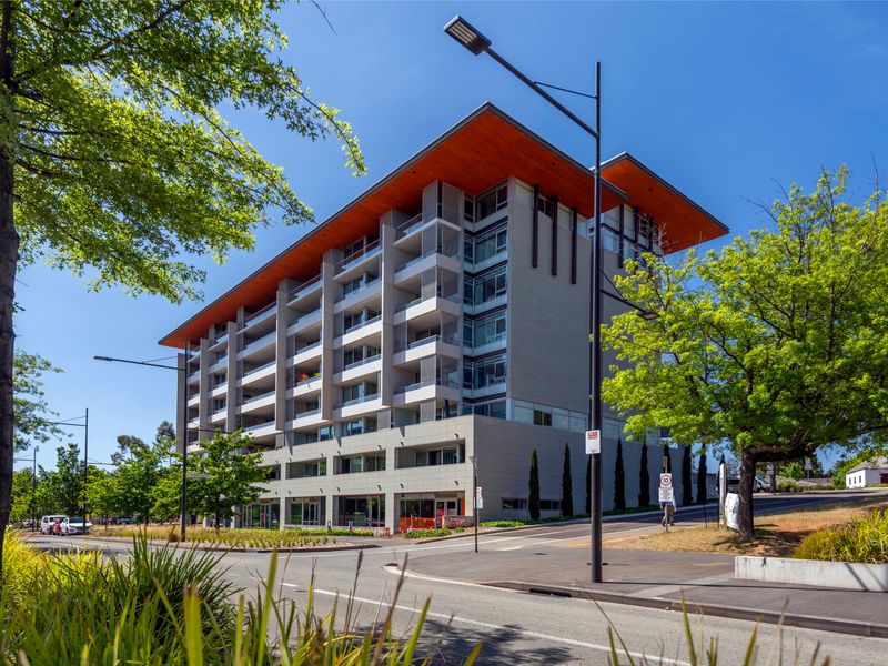 Contemporary apartment building surrounded by leafy streets