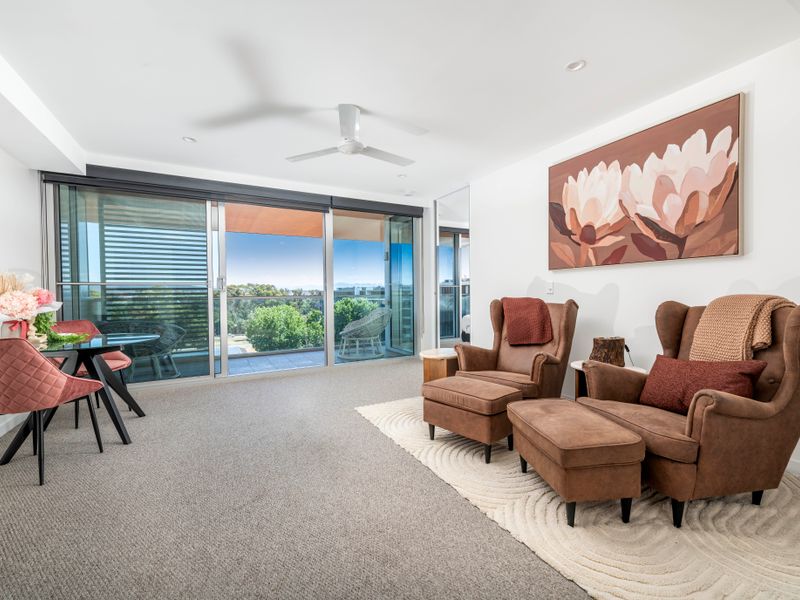 Bright and inviting living area with comfy seating and natural light