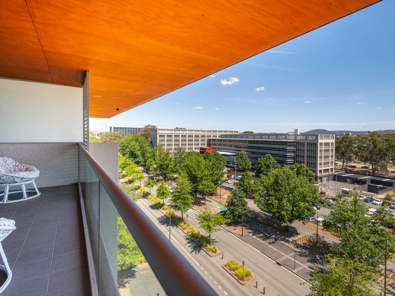 Sunny private balcony overlooking leafy streets and the neighbourhood below
