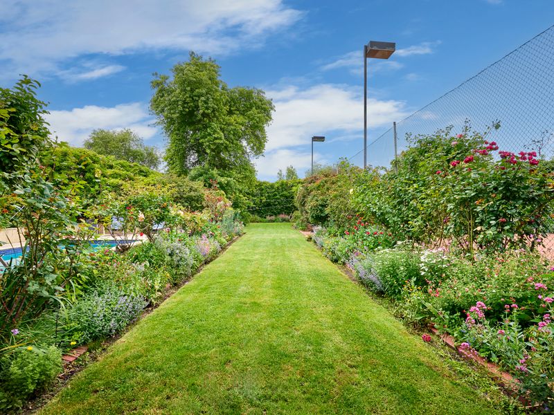 Take a slow stroll through your private garden escape