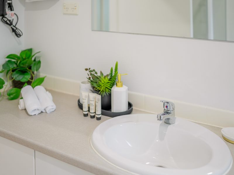 Fresh, functional bathroom ready for your stay