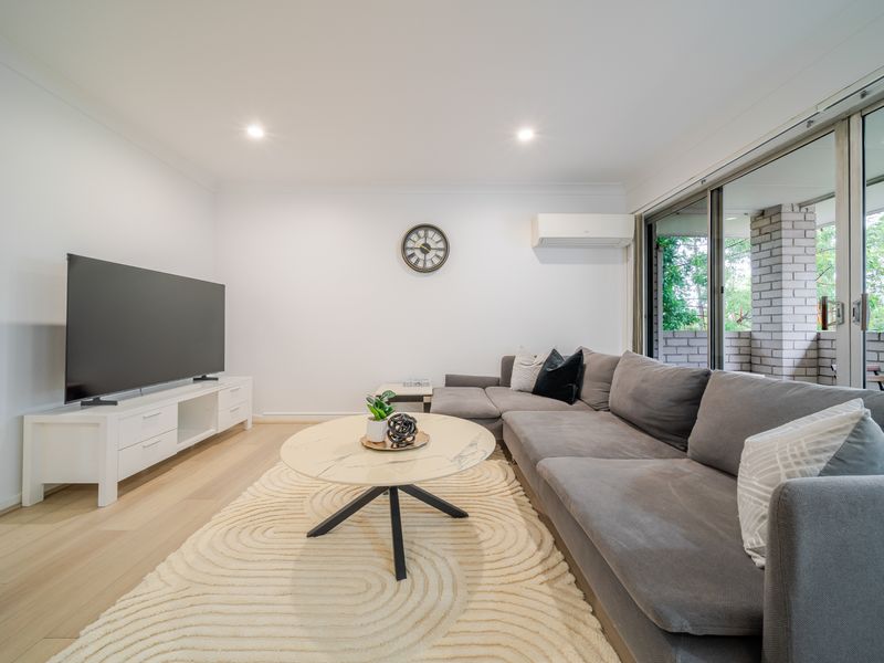 Bright and welcoming living area with comfy seating