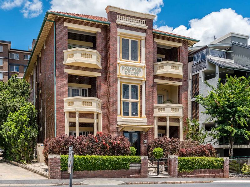 Charming heritage façade with beautifully maintained gardens