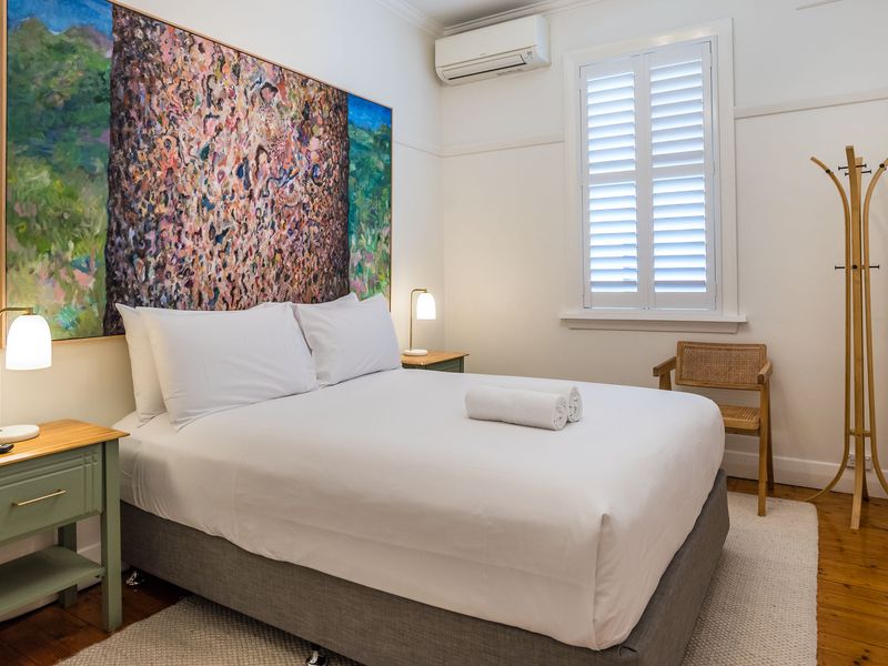 Comfortable guest bedroom with minimalist styling
