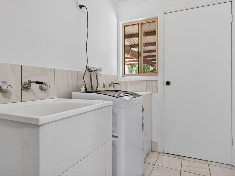 Practical laundry with washer and sink