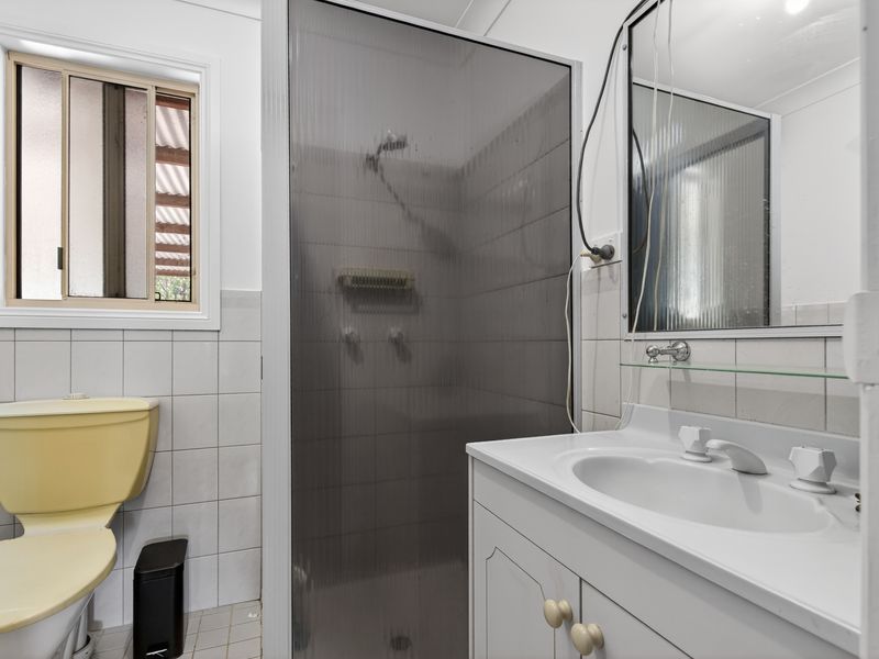Clean bathroom with walk-in shower