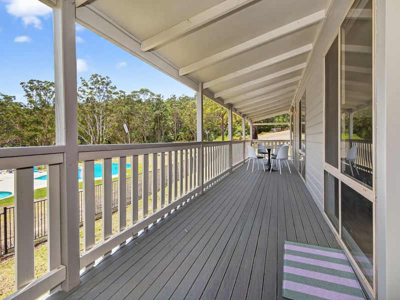 Spacious wrap-around veranda for outdoor living
