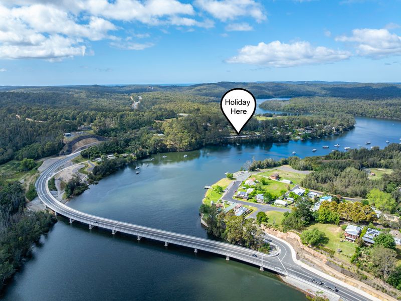 Aerial view showing the peaceful riverside location
