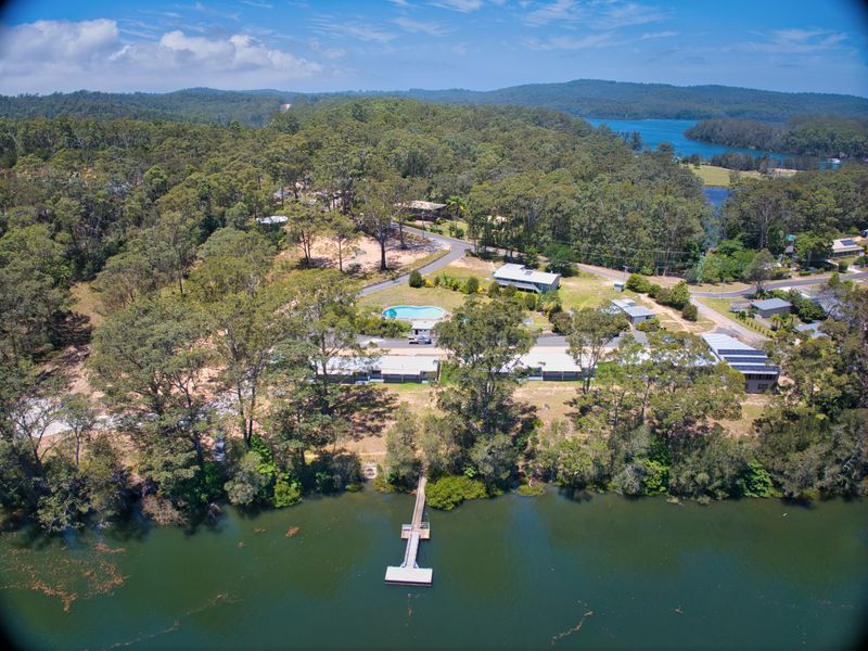 Aerial view showcasing the tranquil riverside setting