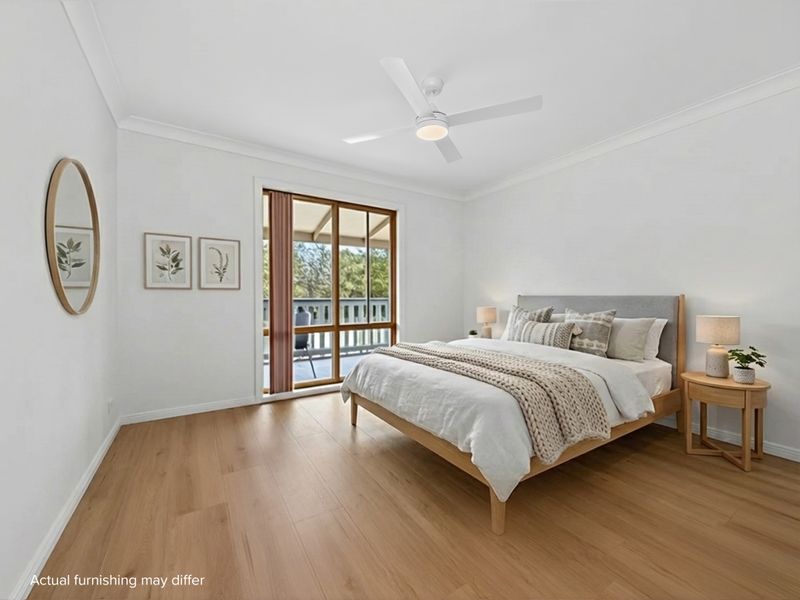 Serene master bedroom with garden outlook