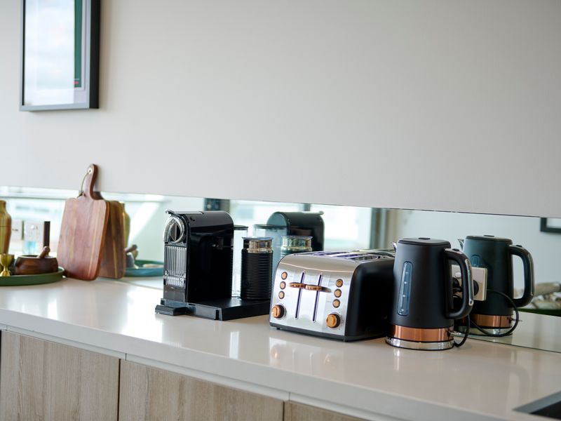 Coffee station with kettle and essentials provided