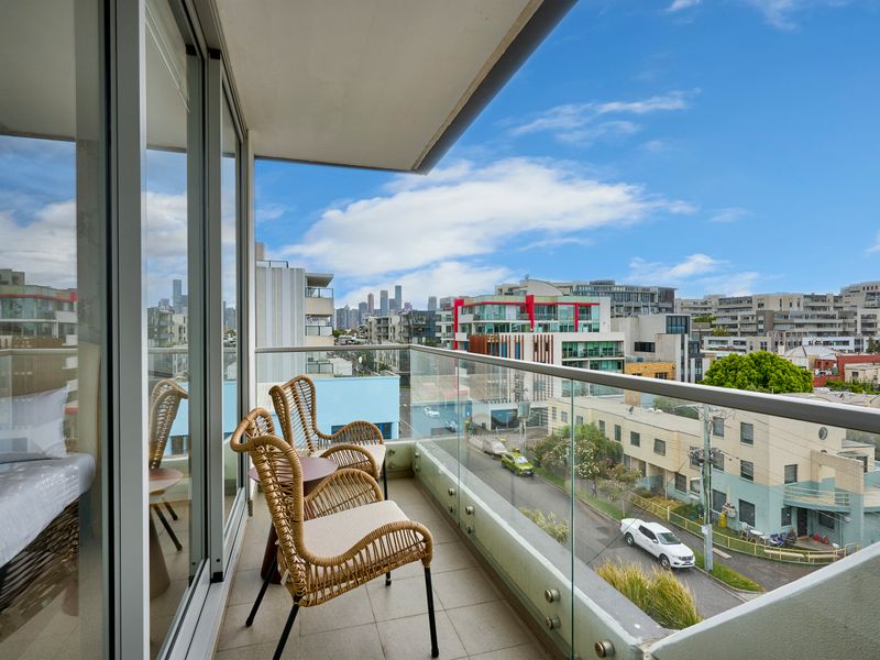 Spacious balcony showcasing sweeping city views