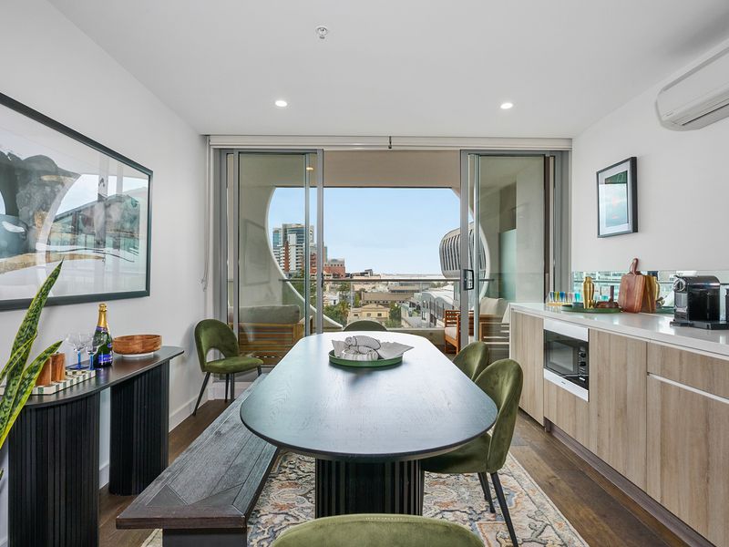 Open dining area with city views and natural light