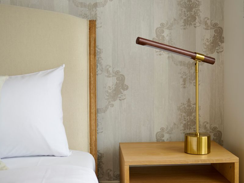 Comfortable bedside setup with warm lighting