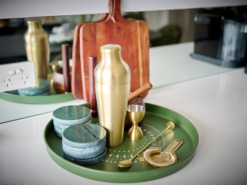 Curated tray with premium amenities and décor