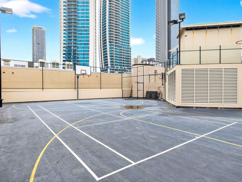 Secure outdoor sports court within the building