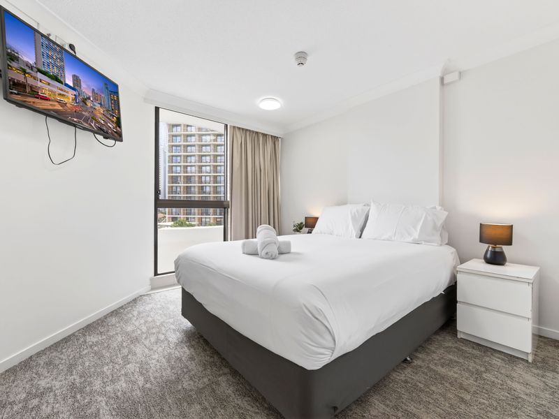 Modern bedroom with plush bedding