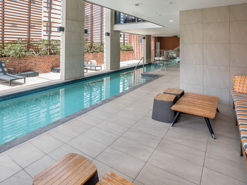 Additional indoor pool area with lounge seating