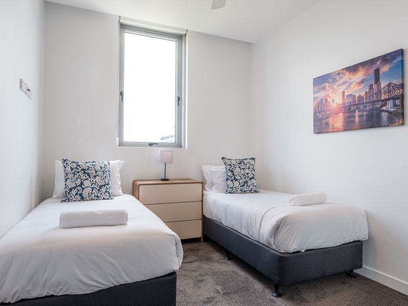 Comfortable second bedroom with fresh linens