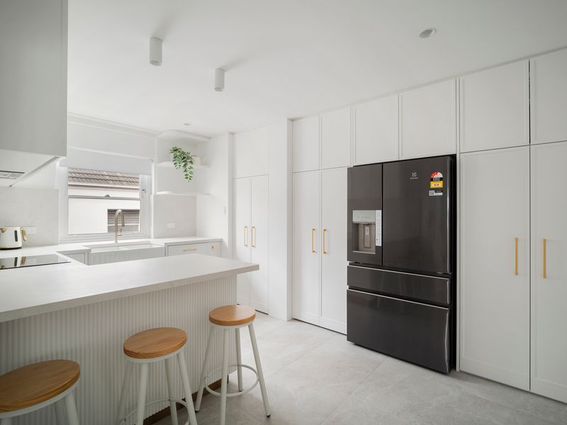 Stylish kitchen with breakfast bar seating