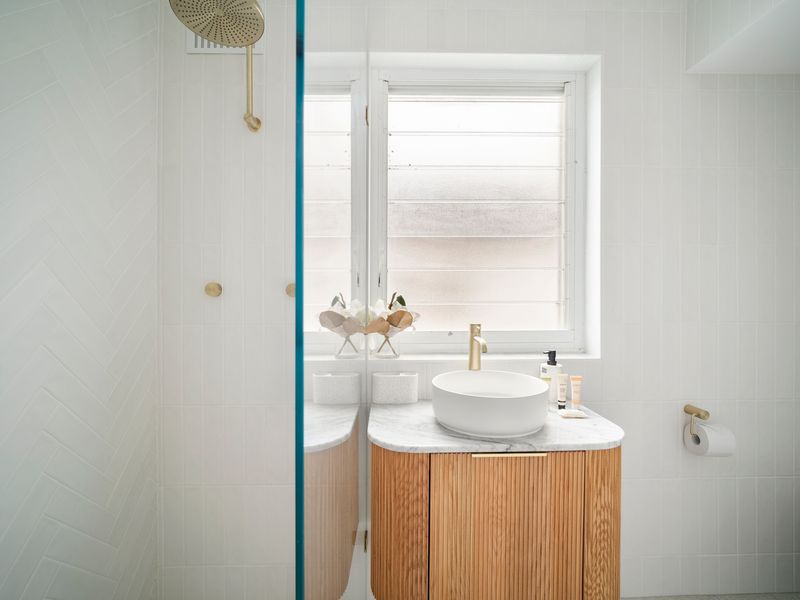 Bright bathroom with vanity and natural light