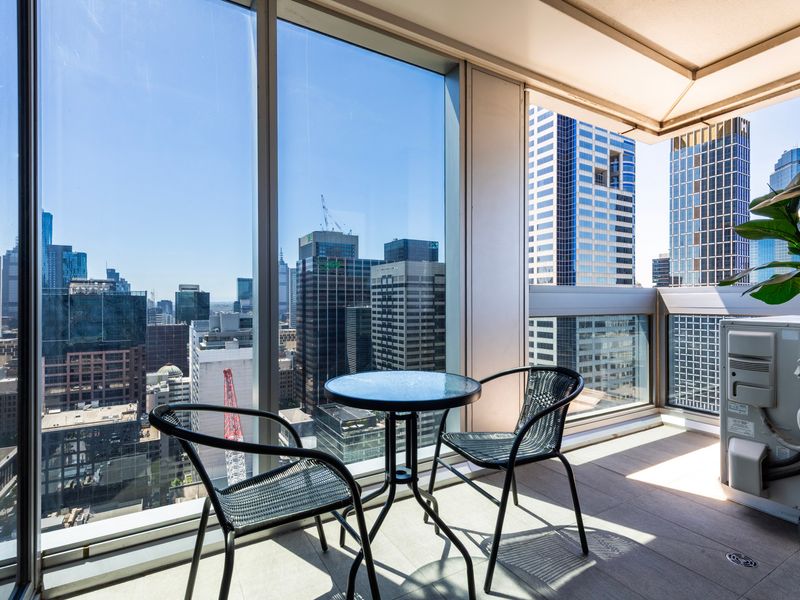 Enjoy your morning coffee or evening drinks on the private balcony with city views