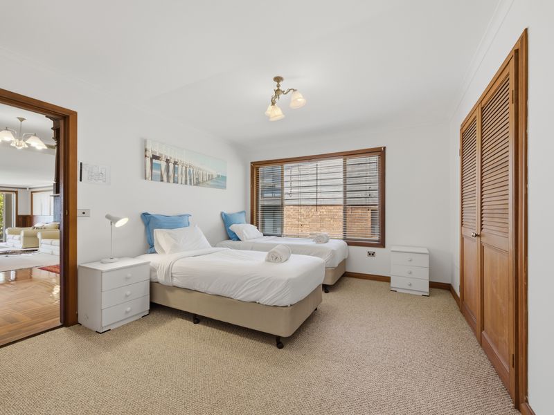Comfortable bedroom with easy access to shared spaces