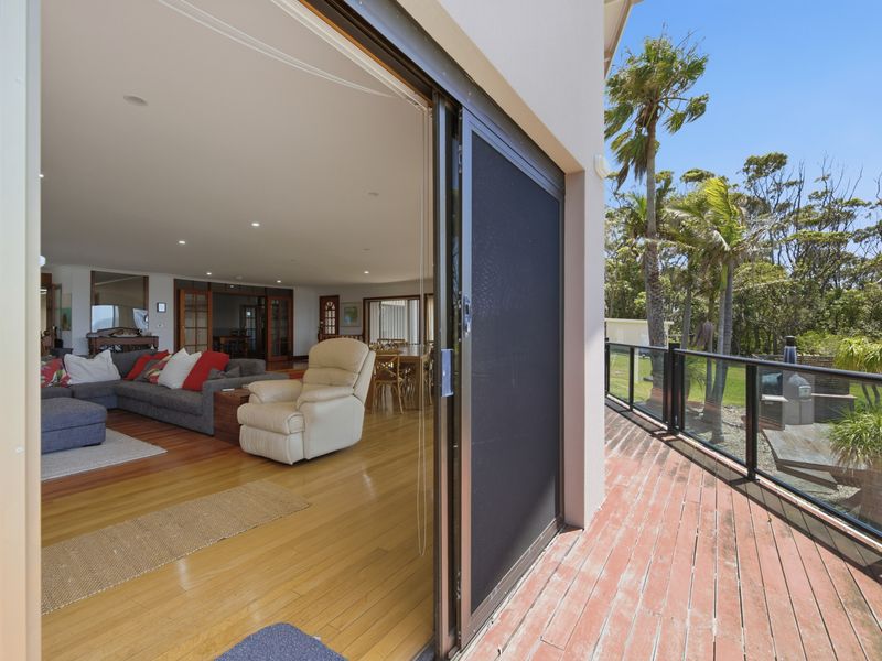 Private balcony surrounded by lush greenery