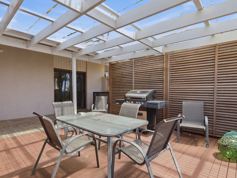 Private alfresco area with BBQ and seating