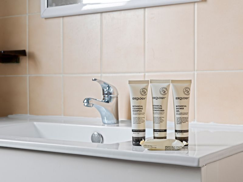 Clean bathroom with complimentary toiletries