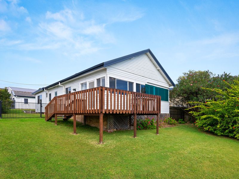 Elevated home with private deck and garden surrounds