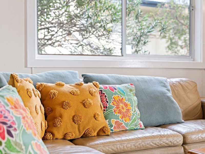 Cozy lounge details with colorful cushions