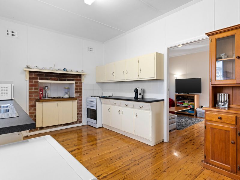 Open kitchen with dining flow and classic charm