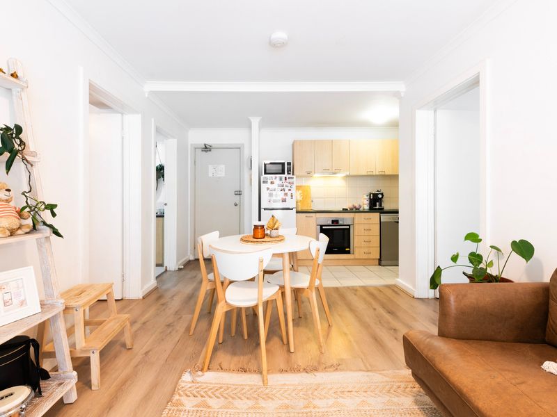 Spacious layout connecting dining, living, and kitchen areas