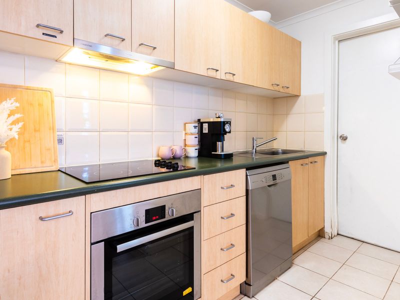 Fully equipped kitchen with modern appliances for easy home cooking