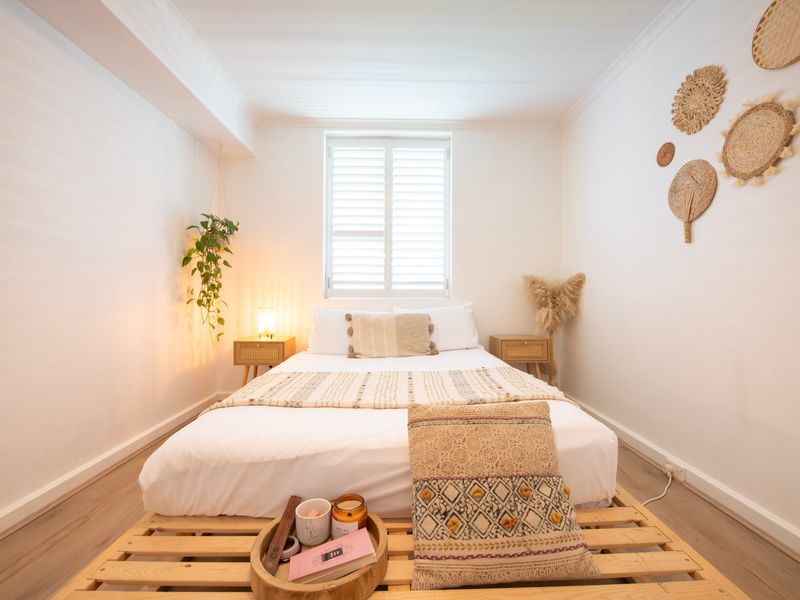 Serene bedroom with natural tones and soft linens