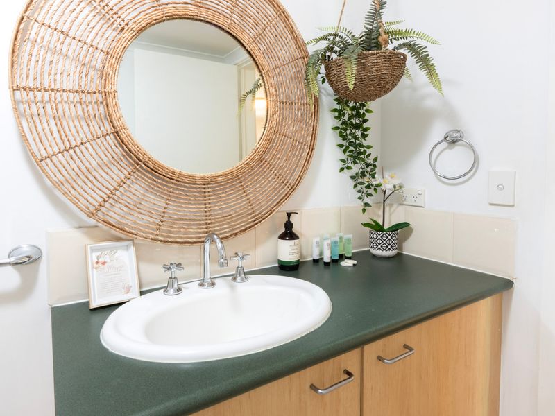 Stylish, well-appointed bathroom featuring modern finishes and a relaxing, spa-like feel