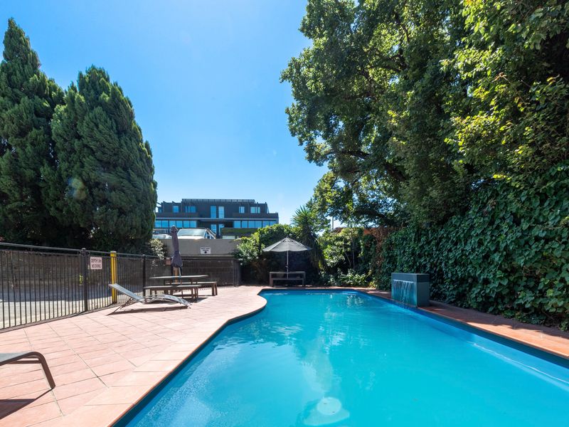 Resort-style swimming pool perfect for a refreshing dip or relaxing poolside.