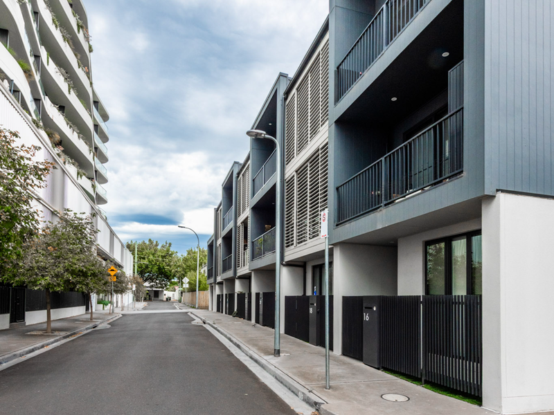 Modern, townhouse living on a quiet, tree-lined street.