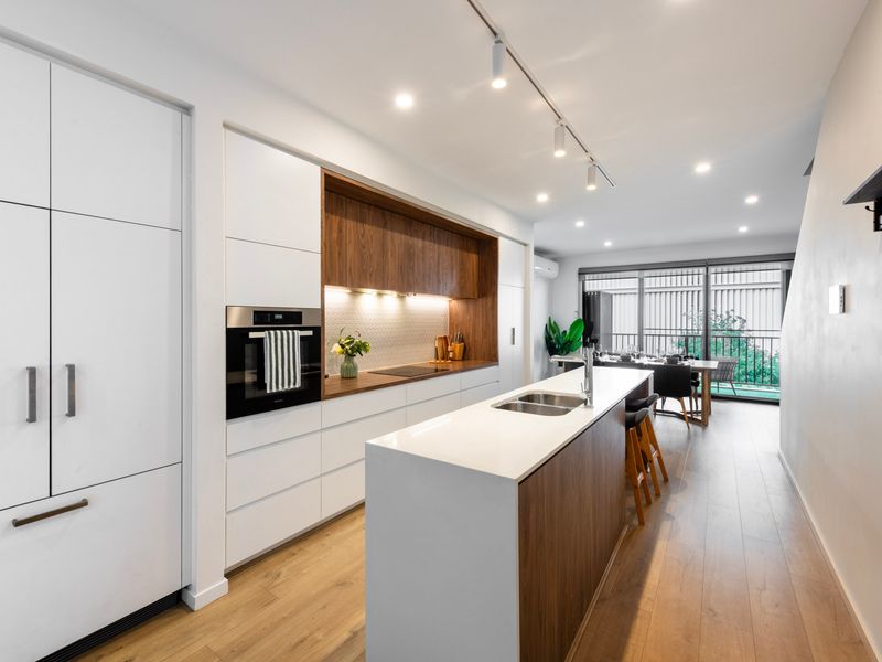 Modern chef’s kitchen with island bench and quality appliances.