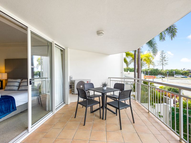Sit on the balcony with a the beach breeze and unwind after a day of swimming