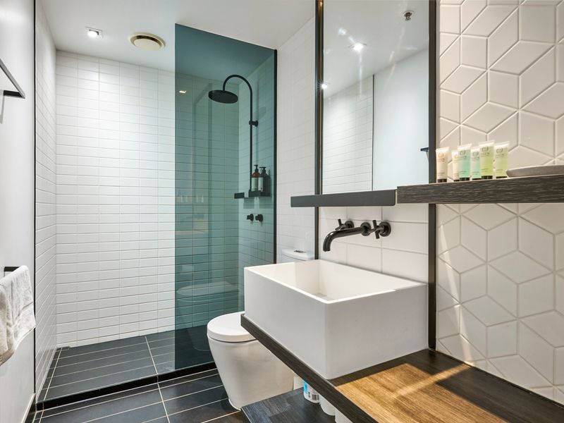 Contemporary bathroom with walk-in shower and stylish finishes.