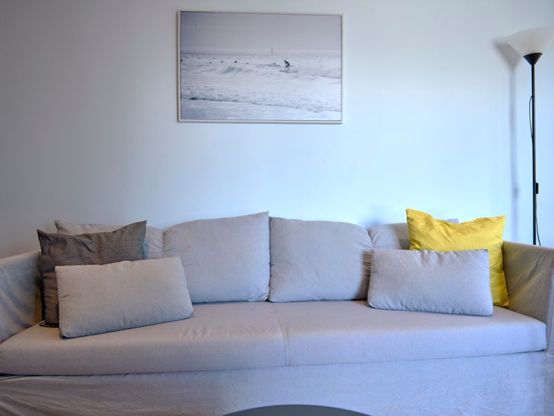 Cozy sofa space ideal for unwinding after a day out.