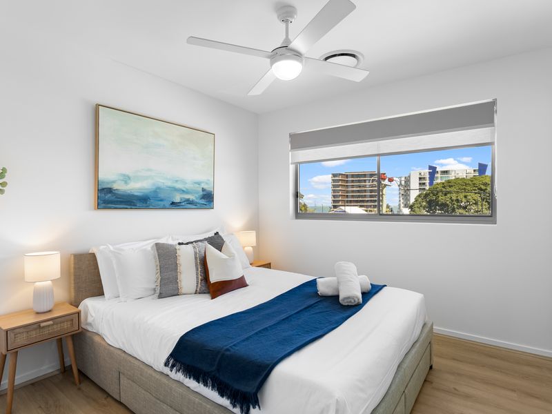 Light filled second bedroom perfect for additional guests or family.