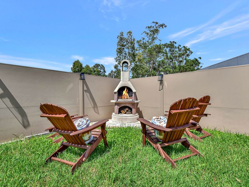 Relax in our cozy rocking chairs by the firepit.