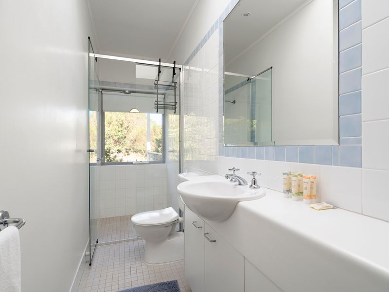 A light-filled bathroom within your bedroom
